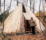 Lodgepoles give the dwelling shape. A rock foundation keeps the poles off the ground—one of several design improvements made on Chris' first lodge.